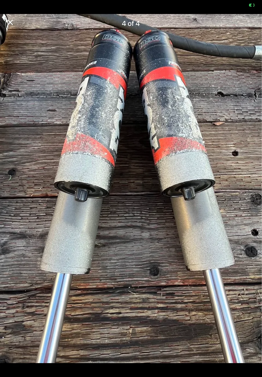 2024 Tacoma Severe Rock/ Gravel chip damage on rear shocks and frame IMG_9874