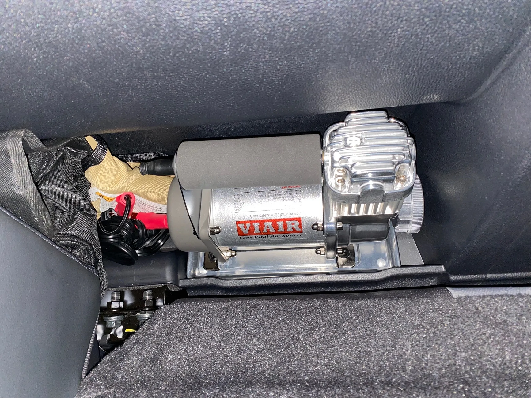 2024 Tacoma Portable compressor fitment behind the rear seat IMG_5178