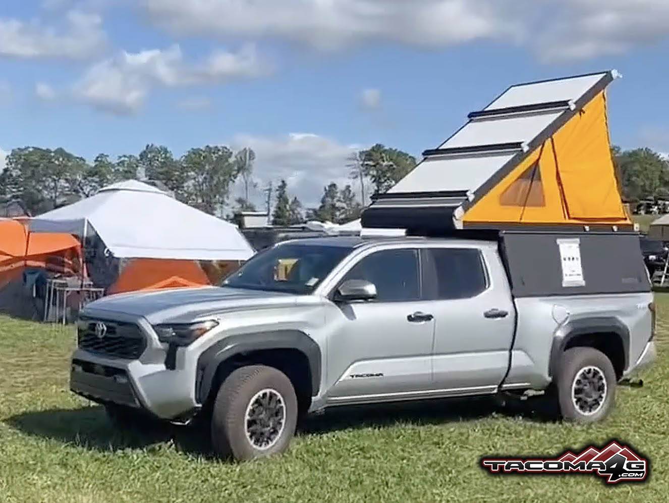 2024 Tacoma GFC Topper Camper on 2024 Tacoma TRD Off-Road Long Bed / Long Boi @ Overland Expo East GFC Topper Camper 2024 Toyota Tacoma Celestial Silver 1