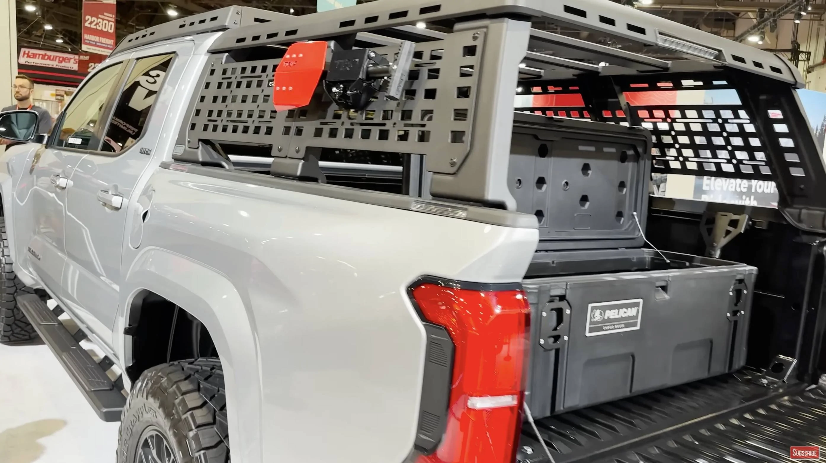 2024 Tacoma Lifted Celestial Silver 2024 Tacoma SR5 on TRD Lift Kit + Parts / Accessories @ SEMA ARB bed cage 2024 Tacoma SR5