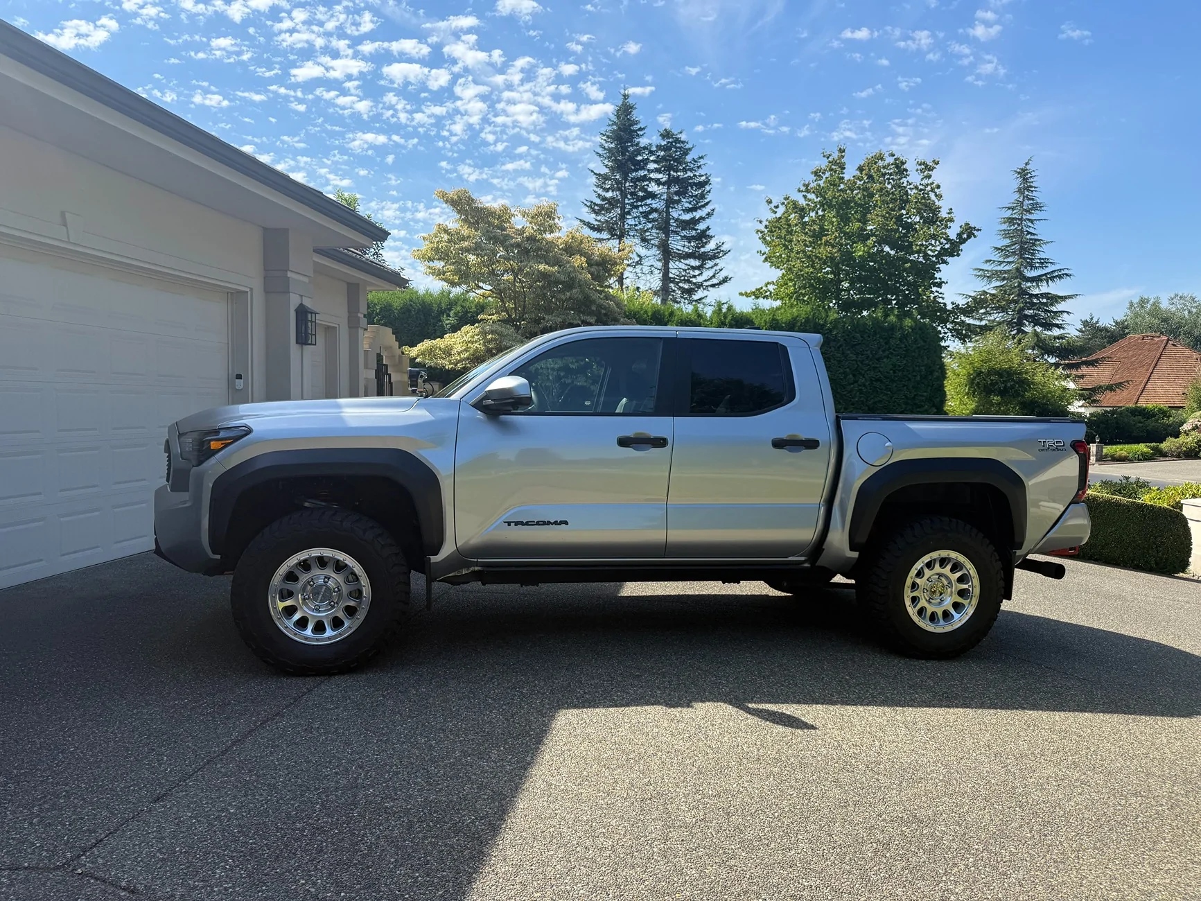 2024 Tacoma Anyone running a factory lift on a TRD Off-Road??? driver lift silver