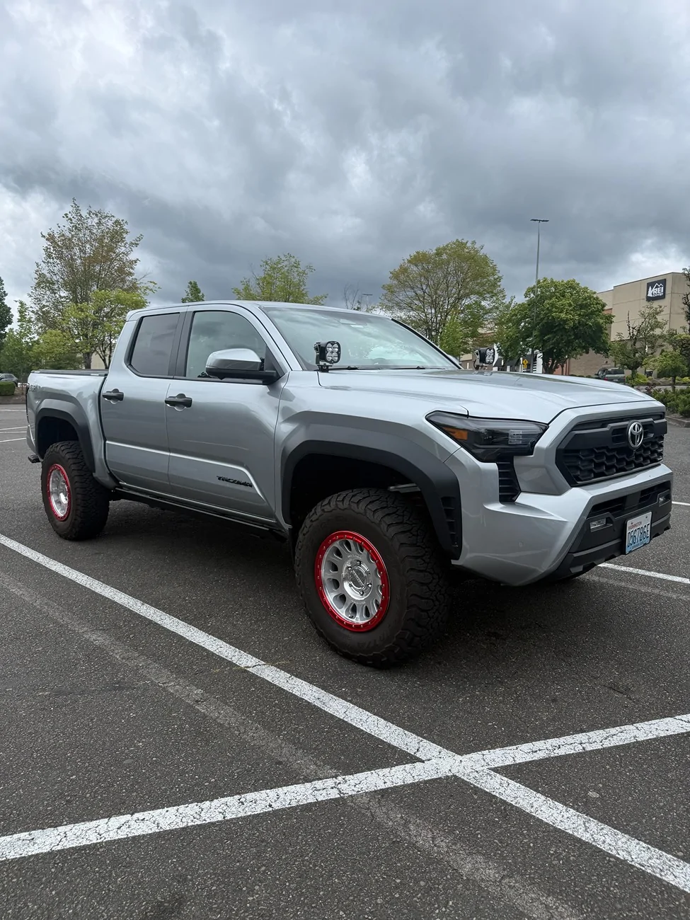 2024 Tacoma Anyone running a factory lift on a TRD Off-Road??? Pass lift red