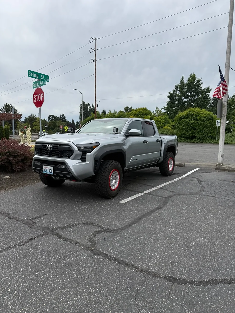 2024 Tacoma Anyone running a factory lift on a TRD Off-Road??? Driver lift red