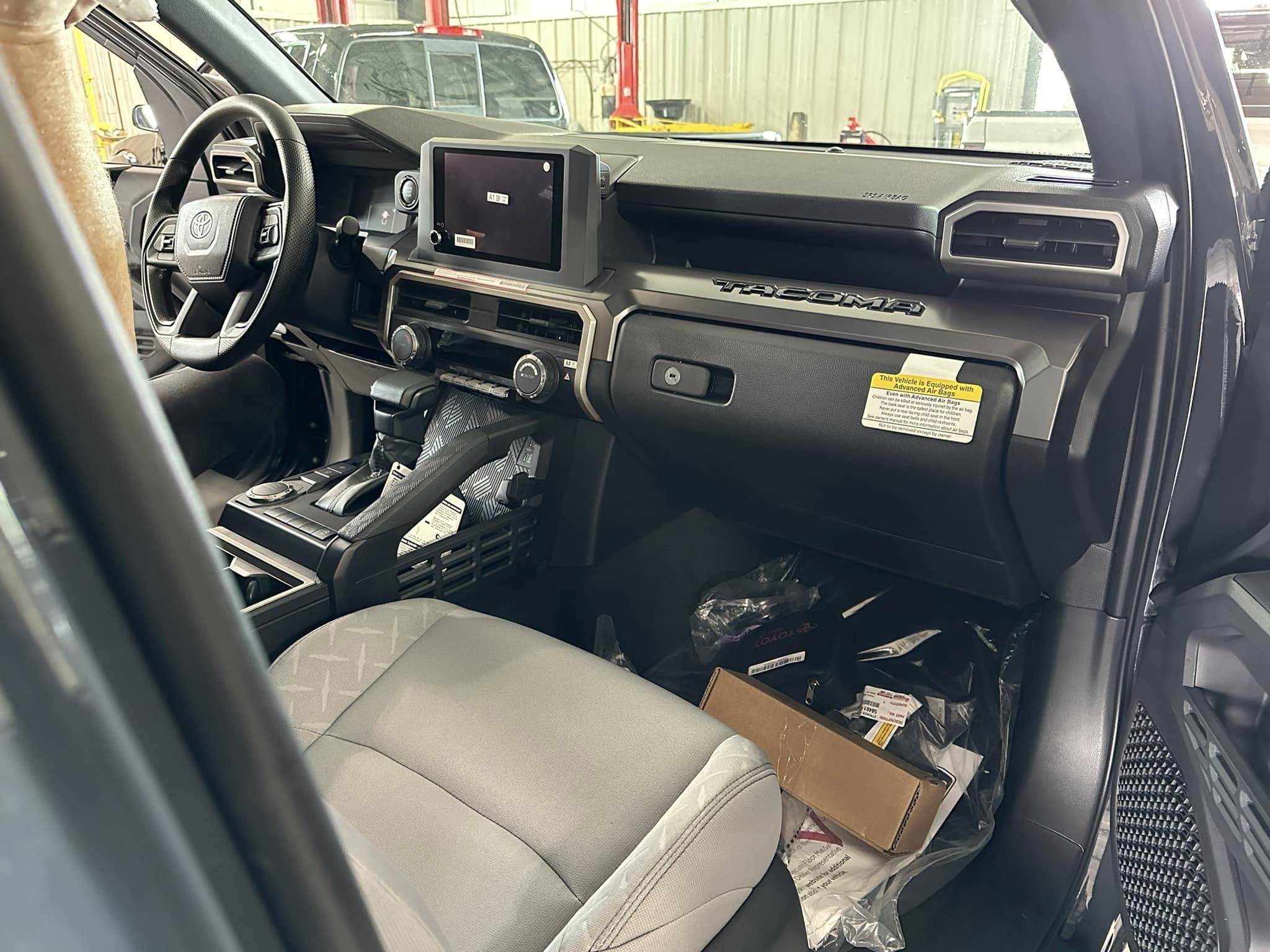 2024 Tacoma Updates of 2024 Tacomas on dealer lots (dealership, pricing, photos) underground-2024-tacoma-sr5-4x2-interior-