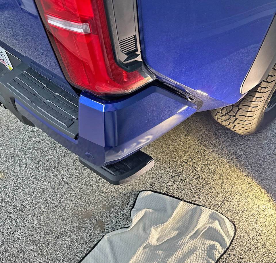 2024 Tacoma Accessories Installed: exhaust tip, bed step, bed cargo divider (molle style) 2024 tacoma bed step accessory 1
