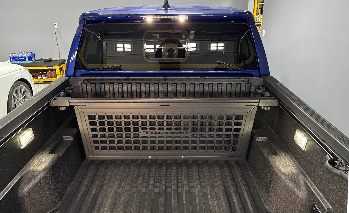 2024 Tacoma Accessories Installed: exhaust tip, bed step, bed cargo divider (molle style) 2024 tacoma bed cargo divider molle style