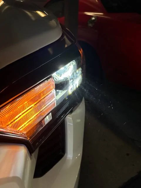 2024 Tacoma Interesting Easter Egg - Japanese words projected onto the headlight cover IMG_0644