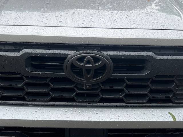 2024 Tacoma Plasti Dip Blackout \ Removing Chrome Toyota emblem on front grill IMG_5648