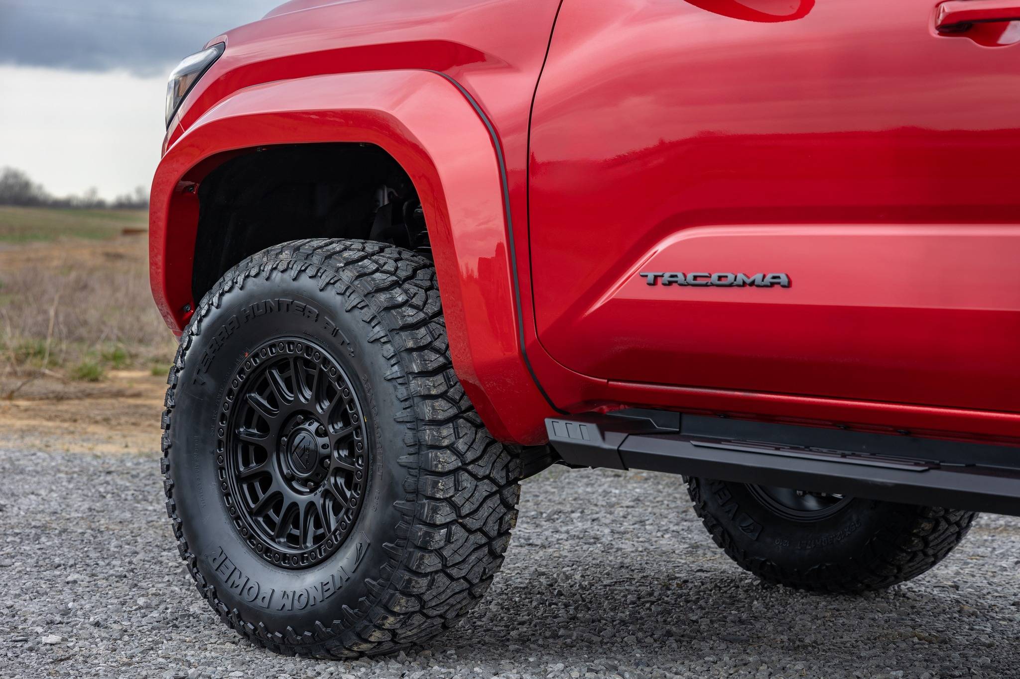 Rough Country 2024 Tacoma 4th Gen parts build: 3.5%22 lift kit, painted fender flares, running...jpg