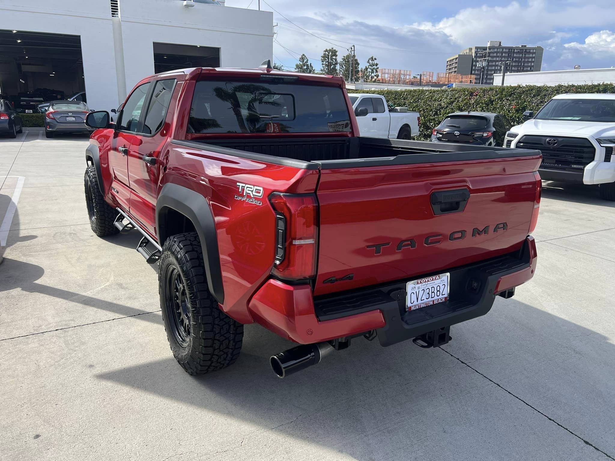 2024 Tacoma TRD SPORT SuperSonic Red + Method 18%22 wheels with 285:70:18 Toyo Open Country A:...jpg