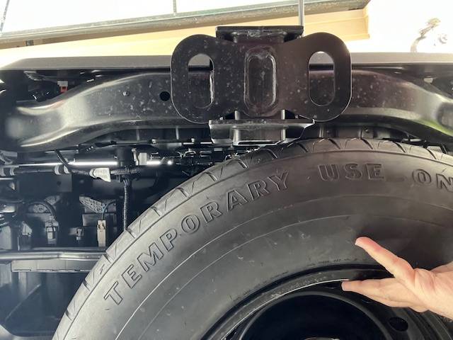 2024 Tacoma Not much room for a larger spare tire under our trucks IMG_6121