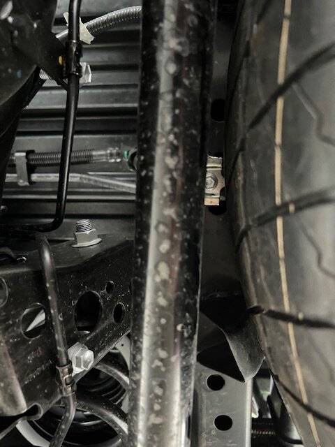 2024 Tacoma Not much room for a larger spare tire under our trucks IMG_6125