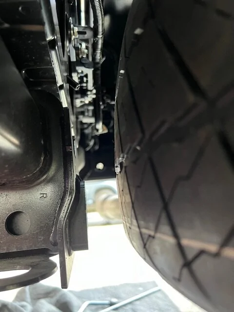 2024 Tacoma Not much room for a larger spare tire under our trucks IMG_6129