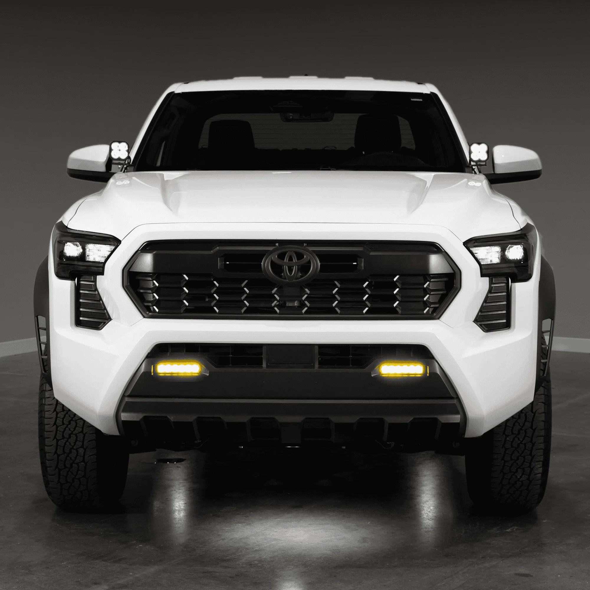 2024 Tacoma SIX (6) NEW Stage Series Lighting Kits for the 2024 Toyota Tacoma | Diode Dynamics 2024_Toyota_Tacoma_Straight_Fog_On