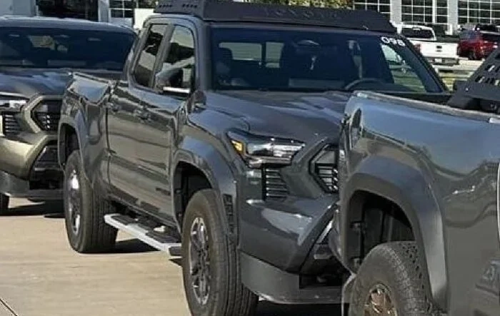 Peek at Underground 2024 Tacoma TRD Sport with side steps and roof rack