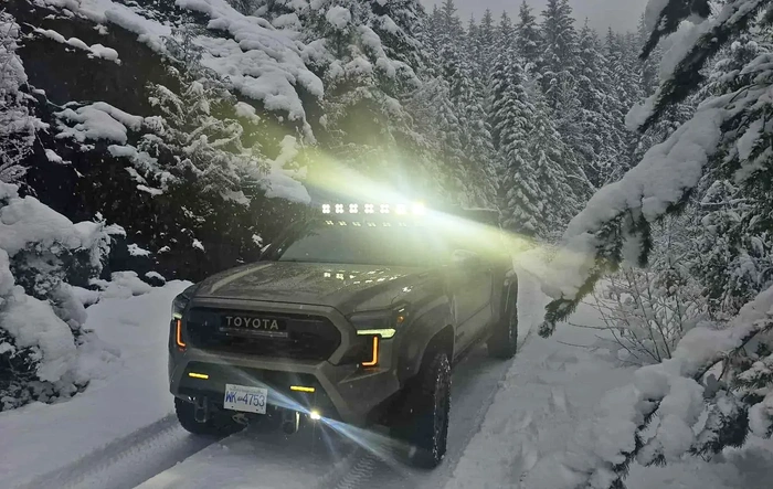 Trailhunter in the snow - mountains of British Columbia