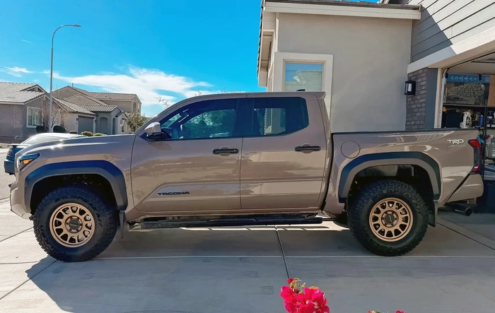 33's (285/70/17 tires) with 703 Method wheels (+35 offset) on factory suspension 2026 Tacoma TRD Off-Road