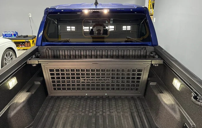 Accessories Installed: exhaust tip, bed step, bed cargo divider (molle style)