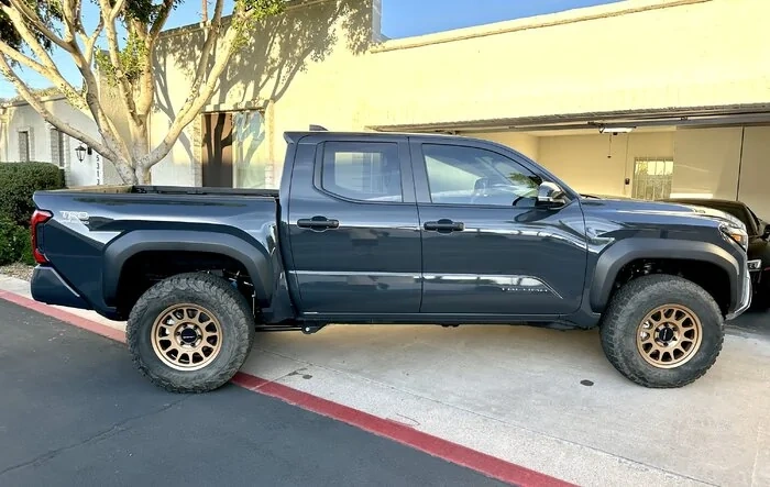 33's (285/70/17 tires) with 703 Method wheels (+35 offset) on factory suspension 2024 Tacoma TRD Off-Road