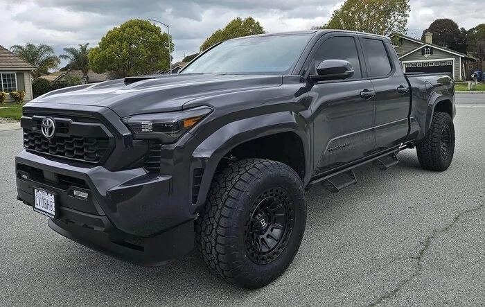 6-ft longbed 2024 Tacoma TRD Sport on 18" Black Rhino Wheels + 305/60R18 TOYO A/T III Tires + 1.5" Leveling Kit